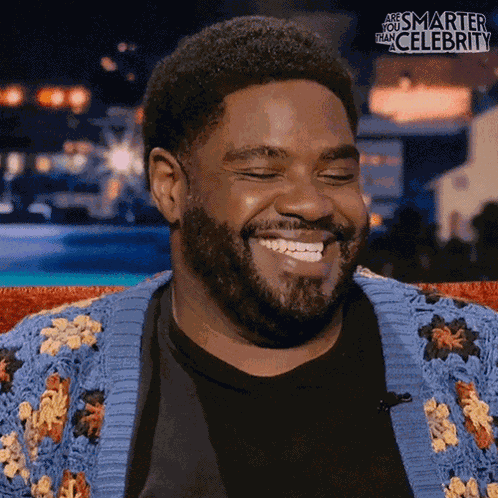 Laughing Ron Funches GIF