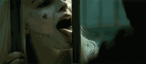 Licks The Bars Harley Quinn GIF