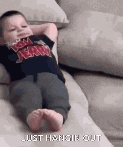 Lil Kid Chilling Chilling On Couch GIF