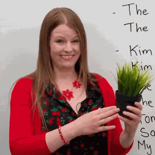 Looking At The Plant Emma GIF