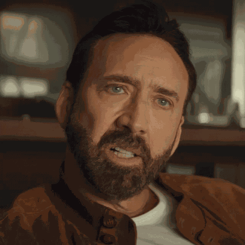 Looking Nick Cage GIF