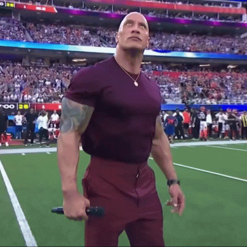 Looking Up Dwayne Johnson GIF