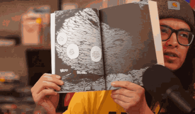 Michael Denicola Art Book GIF