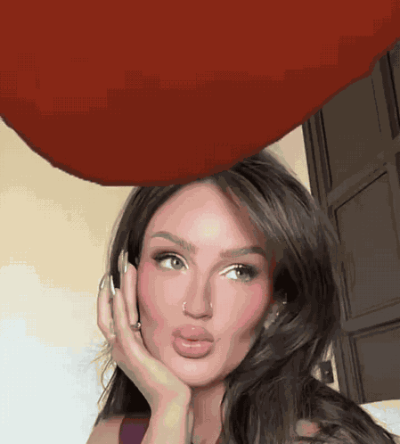 Mikayla Nogueira Tomato In Your Face GIF