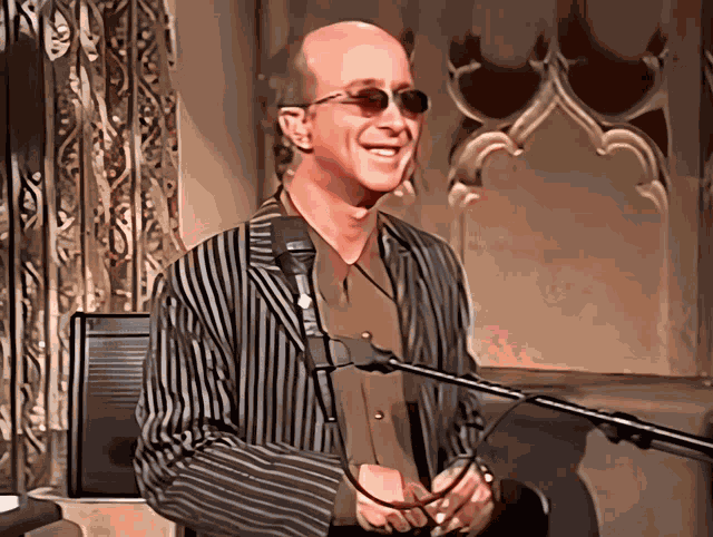 Paul Shaffer Shrug Shoulders GIF