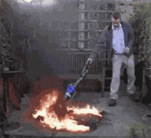 Putting Out Fire Vacuming GIF