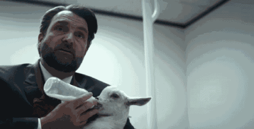 Severence Feeding Baby Goats GIF