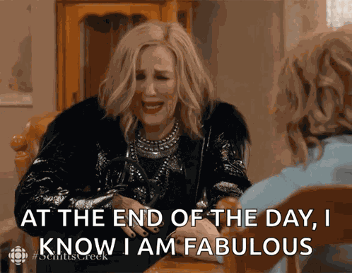 Shrug Catherine Ohara GIF