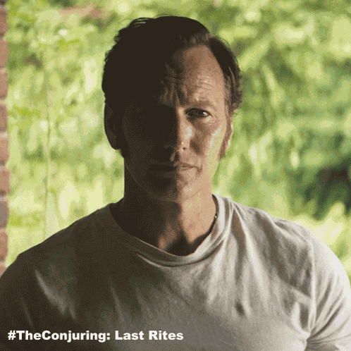 Smiling Ed Warren GIF