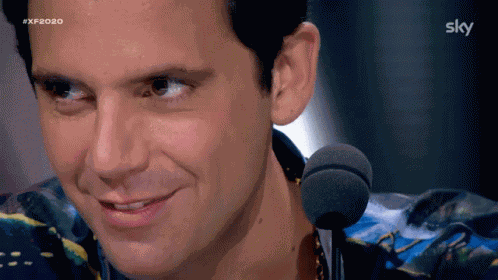 Smiling Mika GIF