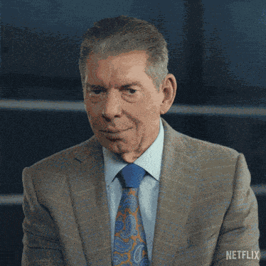 Smiling Vince Mcmahon GIF