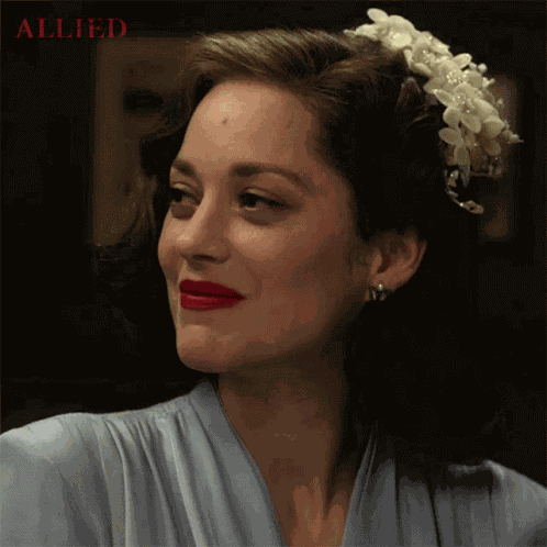 Smirk Marion Cotillard GIF