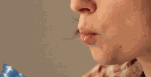 Spitting Funny Woman GIF