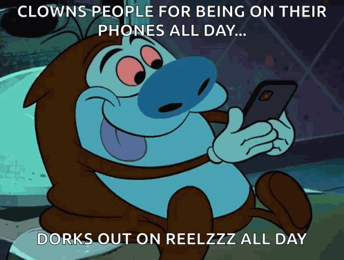 Stimpson J Cat Looking At The Phone GIF