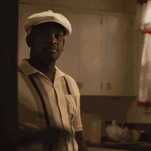 Taking Off Beret Martin Luther King Jr GIF