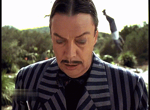 Tim Curry Gomez Addams GIF