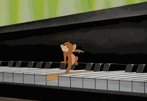 Tom And Jerry Play Piano GIF
