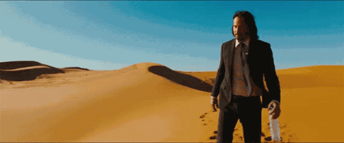 Walking Keanu Reeves GIF