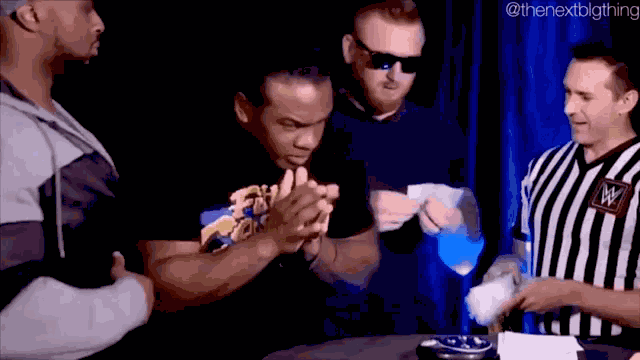 Xavier Woods Birdman Hand Rub GIF